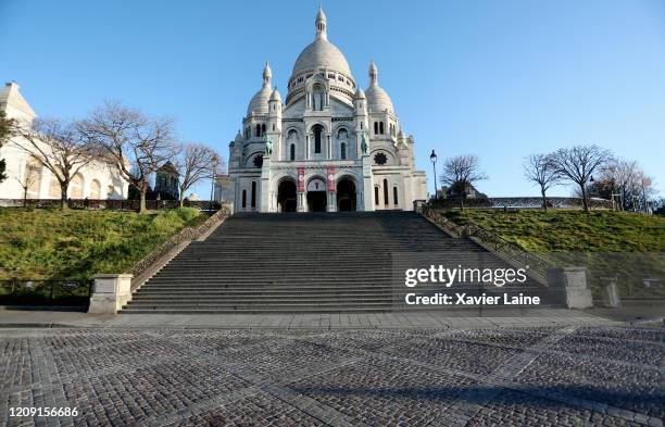 View of the empty Sacré-Coeur cathedral due to the confinement caused by the Coronavirus outbreak on April 5, 2020 in Paris, France. The country is...