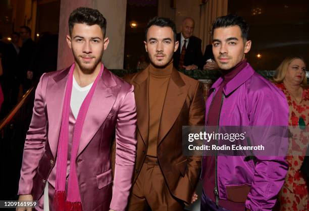 Nick Jonas, Kevin Jonas, and Joe Jonas of the Jonas Brothers pose for portrait at The Women's Cancer Research Fund's An Unforgettable Evening 2020 at...