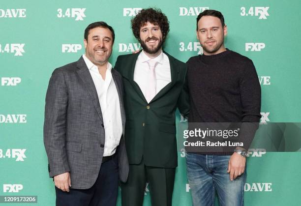 Jeff Schaffer, Dave Burd and Scooter Braun attend the premiere of FXX's "Dave" at Directors Guild Of America on February 27, 2020 in Los Angeles,...