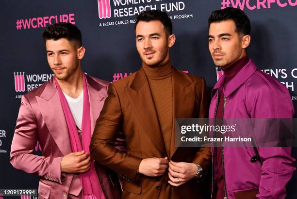 Nick Jonas, Kevin Jonas, and Joe Jonas of Jonas Brothers attend The Women's Cancer Research Fund's An Unforgettable Evening 2020 at Beverly Wilshire,...