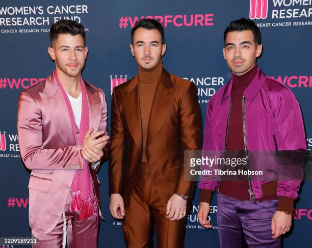 Nick Jonas, Kevin Jonas, and Joe Jonas of The Jonas Brothers attend The Women's Cancer Research Fund's Unforgettable Evening 2020 at Beverly...