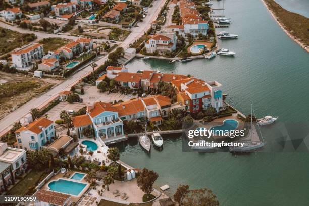 luxury coast real estates - greece aerial stock pictures, royalty-free photos & images