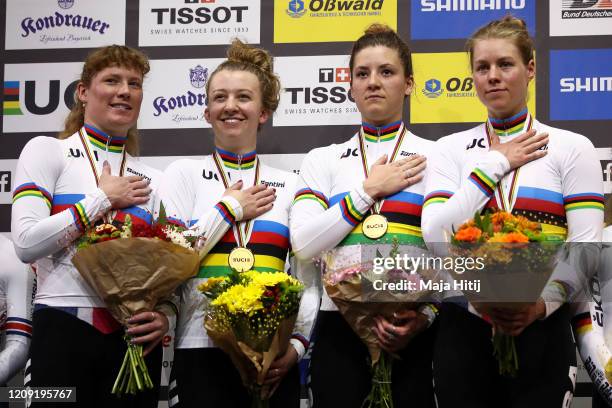 Winners US Jennifer Valente, Chloe Dygert, Emma White and Lily Williams during medal ceremony after winning the Women's Team Pursuit Finals during...