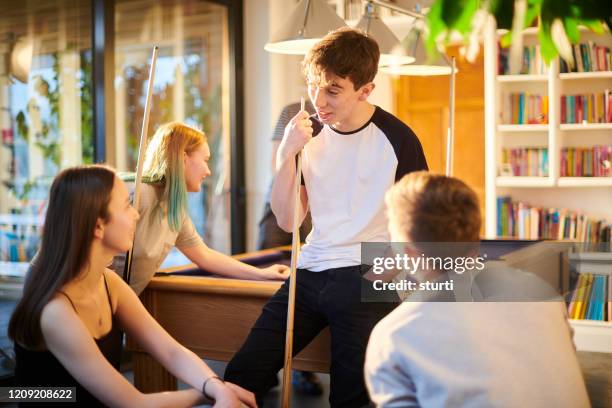 teenagers playing pool - youth club stock pictures, royalty-free photos & images