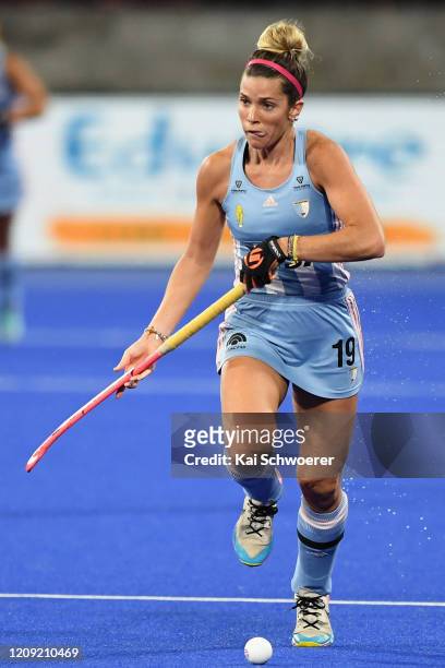 Agustina Albertario of Argentina looks to pass the ball during the FIH Women's Pro League match between the New Zealand Black Sticks Women and...