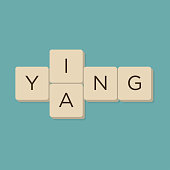 Ying yang wordplay in scrabble letters.