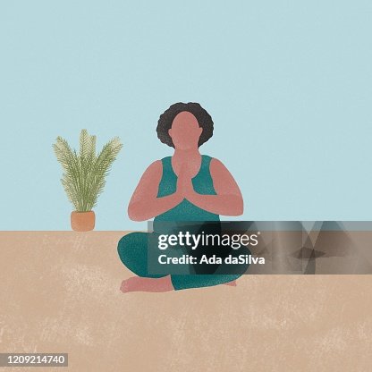 A young plus-sized women doing a yoga A young plus-sized women doing a yoga