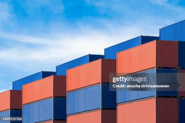 aerial top view container ship crane lifting container for logistic by sea in warehouse. - shipping container top view - fotografias e filmes do acervo