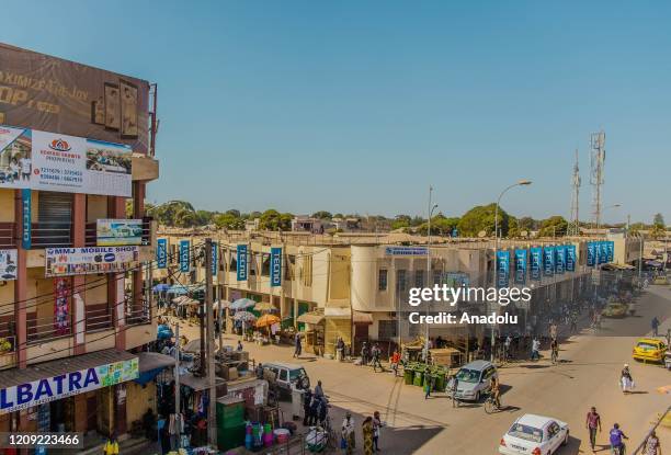 An area is partly crowded as many streets remain empty due to the coronavirus pandemic in Banjul, Gambia on April 04, 2020.