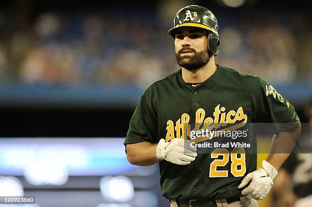 Conor Jackson of the Oakland Athletics looks on during the game against the Toronto Blue Jays August 9, 2011 at Rogers Centre in Toronto, Ontario,...