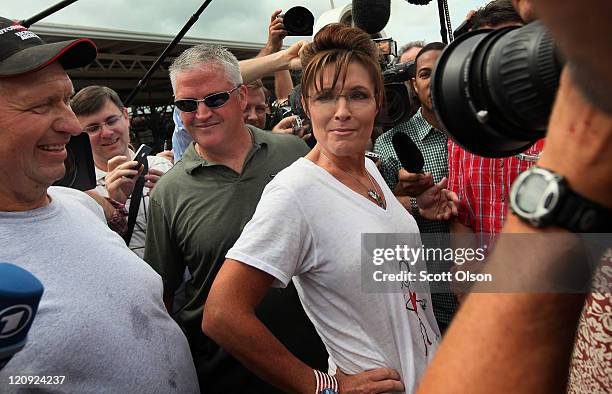 Former Alaska Governor Sarah Palin greets visitors at the Iowa State Fair August 12, 2011 in Des Moines, Iowa. Palin joined most of the declared...