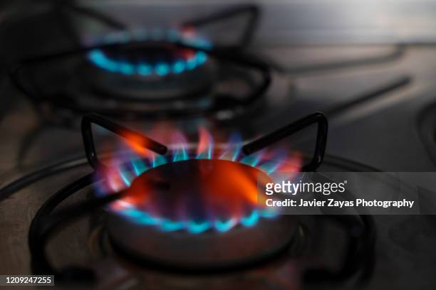 gas flame - gas appliances stock-fotos und bilder