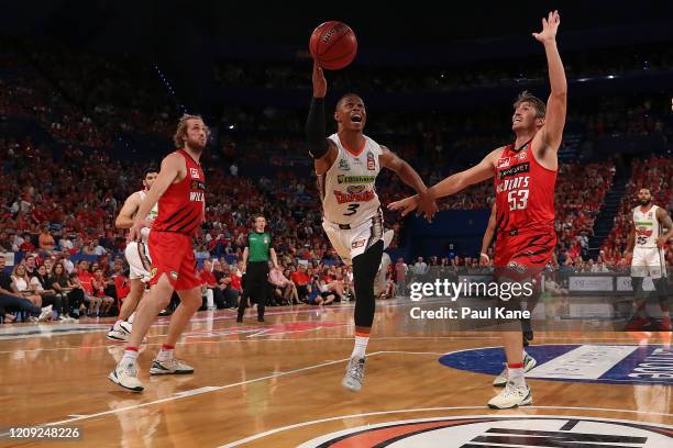 Scott Machado of the Taipans puts a shot up during game one of the NBL Semi Finals Series between the Perth Wildcats and the Cairns Taipans at RAC...