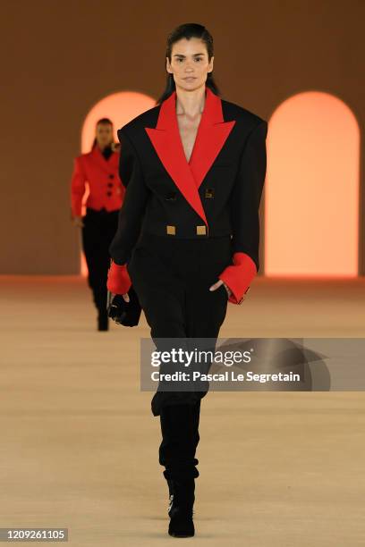 Caroline Ribeiro walks the runway during the Balmain show as part of the Paris Fashion Week Womenswear Fall/Winter 2020/2021 on February 28, 2020 in...