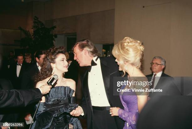 British actress Emma Samms with American businessman Donald Trump and American actress Marla Maples at the 1992 Soap Opera Digest Awards, held at the...