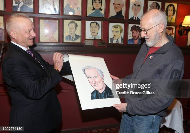 Sardis Max Klimavicius and James Cromwell pose as Sardis honors James Cromwell with his caricature for his performance in broadway's "Grand Horizons"...