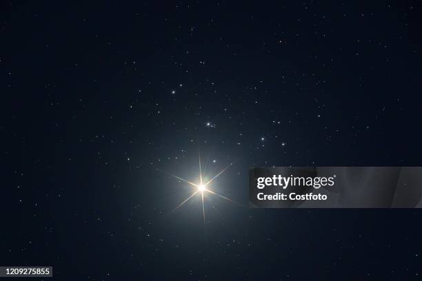 Venus embraces the Pleiades, and 444 light-years apart they meet every eight years. Beijing, China, April 3, 2020. -