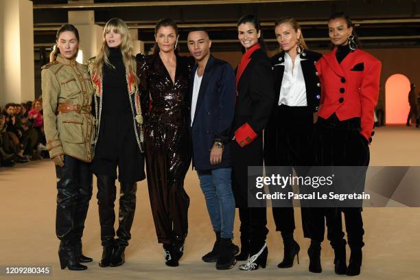Erin Wasson, Laura Morante, a model, Designer Olivier Rousteing, Caroline Ribeiro, Andrea Boehlke and Liya Kebede walk the runway during the Balmain...