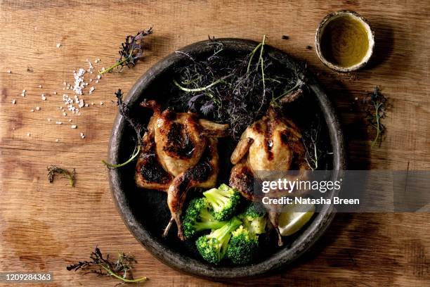 roasted grilled quails - roast pigeon stock pictures, royalty-free photos & images