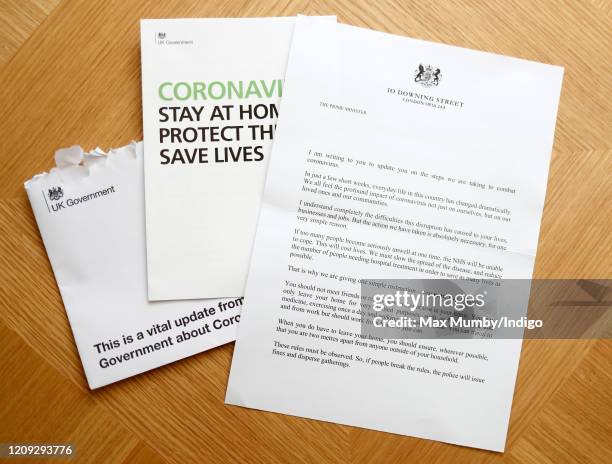 In this photo illustration is a letter received by the photographer from Prime Minister Boris Johnson reiterating the Government's advice regarding...