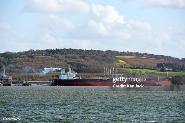 The Liberian-registered oil tanker Goldway berths at Hound Point Oil Terminal on the Forth Estuary, as uncertainty continues in the global oil market...