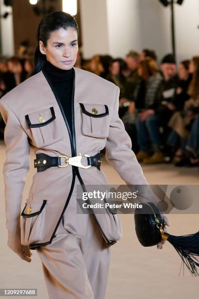Caroline Ribeiro walks the runway during the Balmain show as part of the Paris Fashion Week Womenswear Fall/Winter 2020/2021 on February 28, 2020 in...