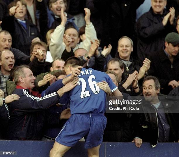John Terry of Chelsea celebrates in the AXA sponsored FA Cup Sixth Round match against Gillingham played at Stamford Bridge in London, England. The...