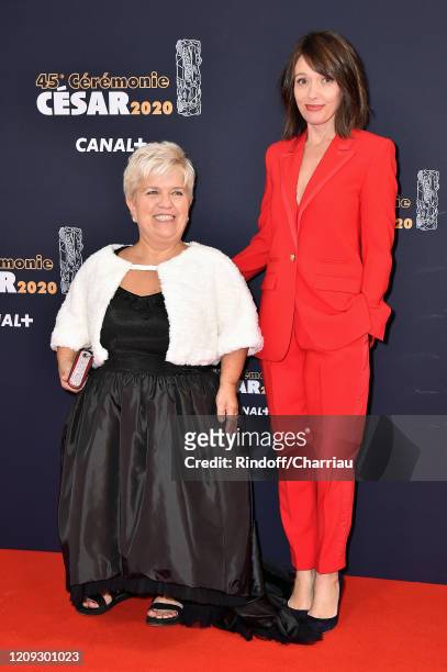 Mimie Mathy and Anne Marivin pose on the Cesar Film Awards 2020 Ceremony red carpet for an episode of 'Call my agent' At Salle Pleyel In Paris on...