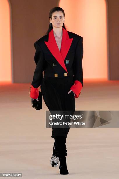 Caroline Ribeiro walks the runway during the Balmain show as part of the Paris Fashion Week Womenswear Fall/Winter 2020/2021 on February 28, 2020 in...