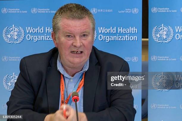 Grab taken from a video released by the World Health Organization shows WHO Health Emergencies Programme Director Michael Ryan attending a virtual...