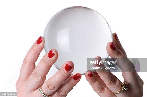 woman holding crystal ball - hands holding crystal ball stock pictures, royalty-free photos & images