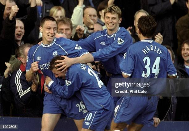 Chelsea's players celebrate John Terry's goal in the AXA sponsored FA Cup Sixth Round match against Gillingham played at Stamford Bridge in London,...