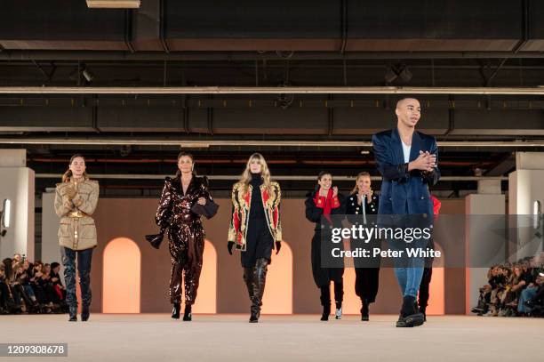 Erin Wasson, Helena Christensen, Julia Stegner, Caroline Ribeiro, Esther Cañadas and Olivier Rousteing walk the runway during the Balmain show as...