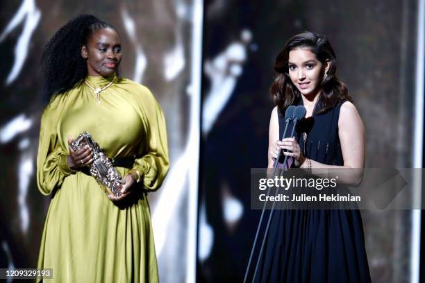 Aissa Maiga and Lyna Khoudri who receives the best female newcomer award for 'Papicha' on stage during the Cesar Film Awards 2020 Ceremony At Salle...