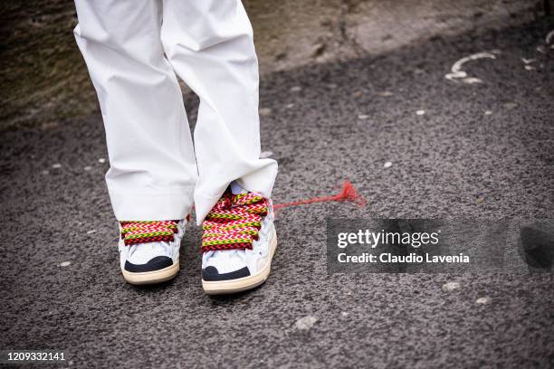 Declan Chan, sneakers detail, is seen outside Mugler, during Paris Fashion Week - Womenswear Fall/Winter 2020/2021 : Day Three on February 26, 2020...