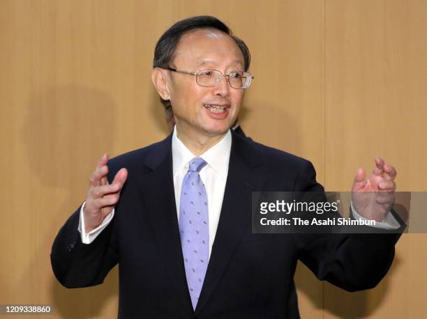 China's Central Foreign Affairs Commission Director Yang Jiechi speaks to media reporters after his meeting with Japanese Prime Minister Shinzo Abe...