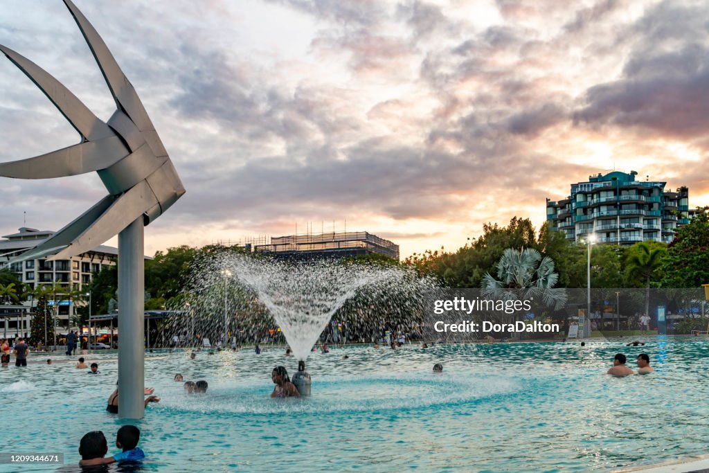 Tropical swimming lagoon on the Esplanade in Cairns with artificial beach, Queensland, Australia