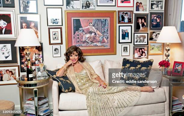 Actress Dame Joan Collins reclining on the sofa in her West Hollywood, California penthouse apartment in March 2015, shortly after being awarded a...