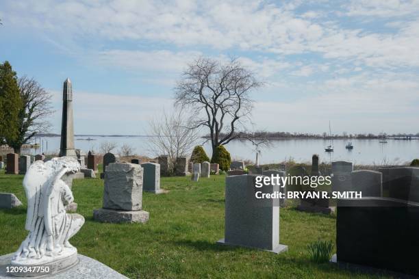 The Pelham Cemetery on City Island and Hart Island is in Long Island Sound on April 7, 2020 in New York. - Hart Island has been the location of a...