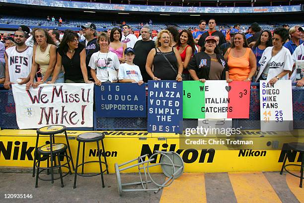 New York Mets fans welcome Mike Piazza of the San Diego Padres back to Shea Stadium for Piazza's first visit to Shea stadium since leaving the New...