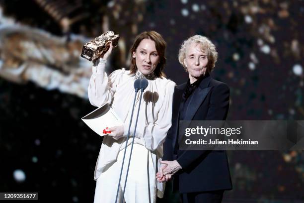 Emmanuelle Bercot and Claire Denis speak on stage with the best director award for 'J'accuse' won by Roman Polanski during the Cesar Film Awards 2020...