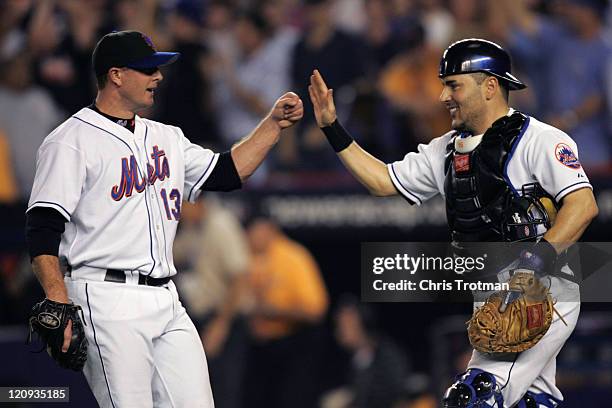 Pitcher Billy Wagner of the New York Mets is congratulated by catcher Paul Lo Duca on his save against the Los Angeles Dodgers during game one of the...