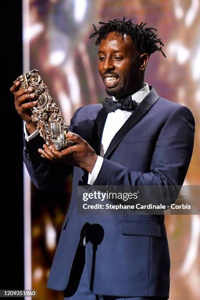 Ladj Ly who receives the César people’s choice award for 'Les Misérables' on stage during the Cesar Film Awards 2020 Ceremony At Salle Pleyel In...