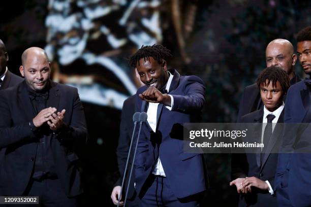 Ladj Ly receives the best film award for 'Les Misérables' on stage during the Cesar Film Awards 2020 Ceremony At Salle Pleyel In Paris on February...