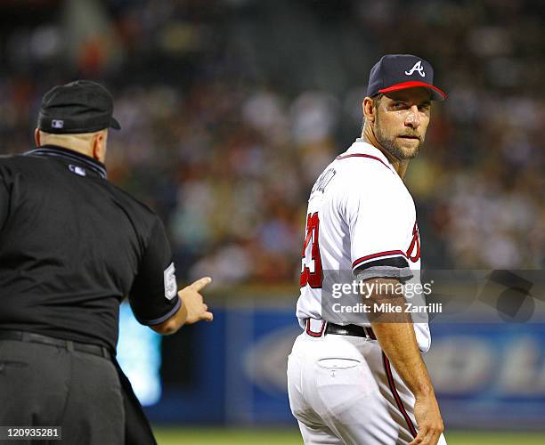 Atlanta Braves pitcher John Smoltz gets a warning from the umpire after arguing a call during the game between the Atlanta Braves and the Florida...