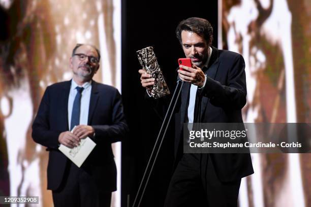 Nicolas Bedos receives the best original screenplay award for "La Belle Époque" on stage during the Cesar Film Awards 2020 Ceremony At Salle Pleyel...