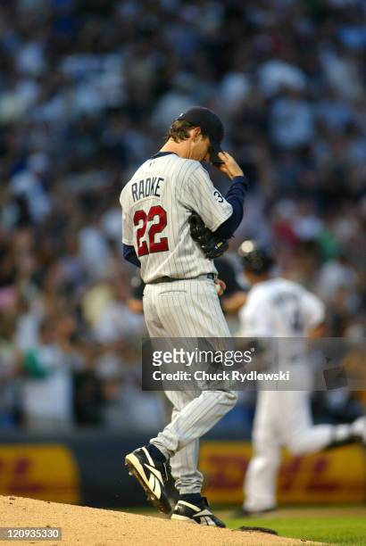 Minnesota Twins Starter, Brad Radke, tries to regain his composure after giving up a home run to Paul Konerko during the game against the Chicago...