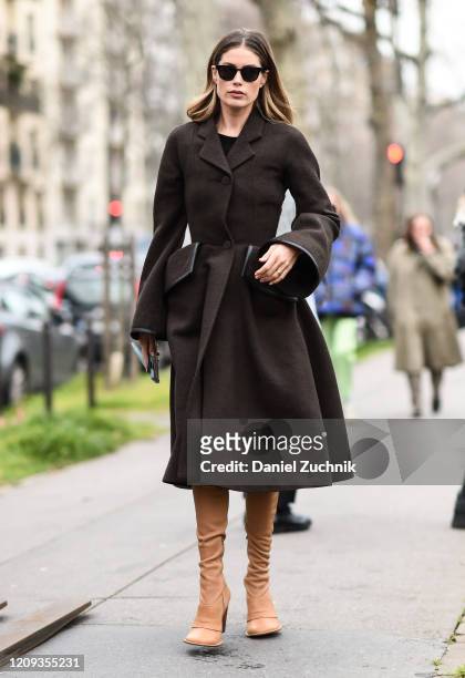 Doutzen Kroes is seen wearing a Loewe coat outside the Loewe show during Paris Fashion Week: AW20 on February 28, 2020 in Paris, France.