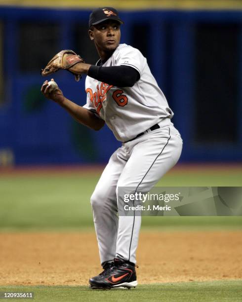 Baltimore's Melvin Mora looks to make the throw over to first for the out in Sunday's game against the Tampa Bay Devil Rays at Tropicana Field in St....