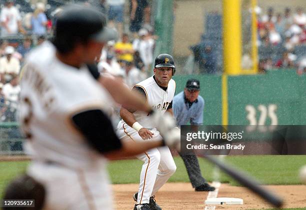 Pirates' Tony Alvarez watches Chris Stynes hit a double that would knock in both Alvarez and Craig Wilson in the sixth inning of the game against the...